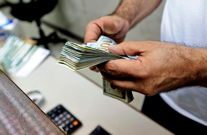 أزمة "سعر الصرف" تكشف هيمنة أحزاب على بنوك العراق
