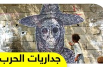 فنان يمني يحول معاناة شعبه إلى رسومات جدارية