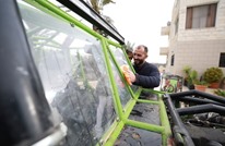 فلسطيني يصنع مركبة رباعية الدفع من "الخردة" (صور)