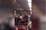 امرأة شبه عارية هددت بتفجير طائرة متجهة لبريطانيا (فيديو)